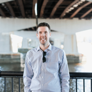 Professional headshot of Justin Rollo, top Weymouth real estate agent